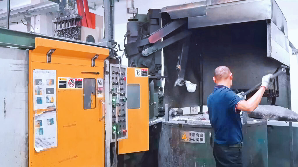 Honjenny workers are putting aluminum into the furnace.